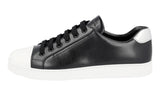 Prada Women's Black Leather Downtown Cap Toe Sneaker 1E663I