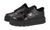 Prada Women's Black Leather Downtown Bold Shearling Fur Platform Sneaker 1E947M