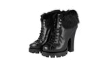 Prada Women's Black welt-sewn Leather Shearling Fur Half-Boot 1TP189