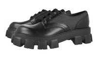 Prada Men's Black Brushed Spazzolato Leather Monolith Loafers 2EE342