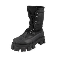 Prada Men's Black Monolith Shearling Boots 2UE014